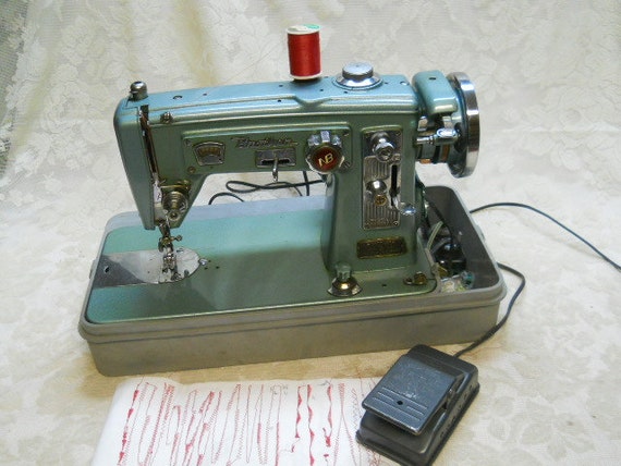 Antique sewing machine with table