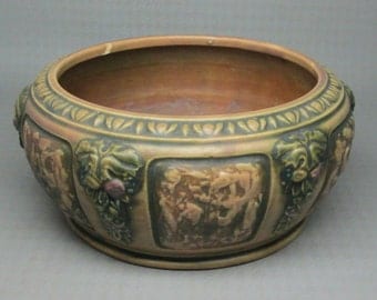 vintage / antique ROSEVILLE florentine bowl with grapes being sold AS IS due to condition