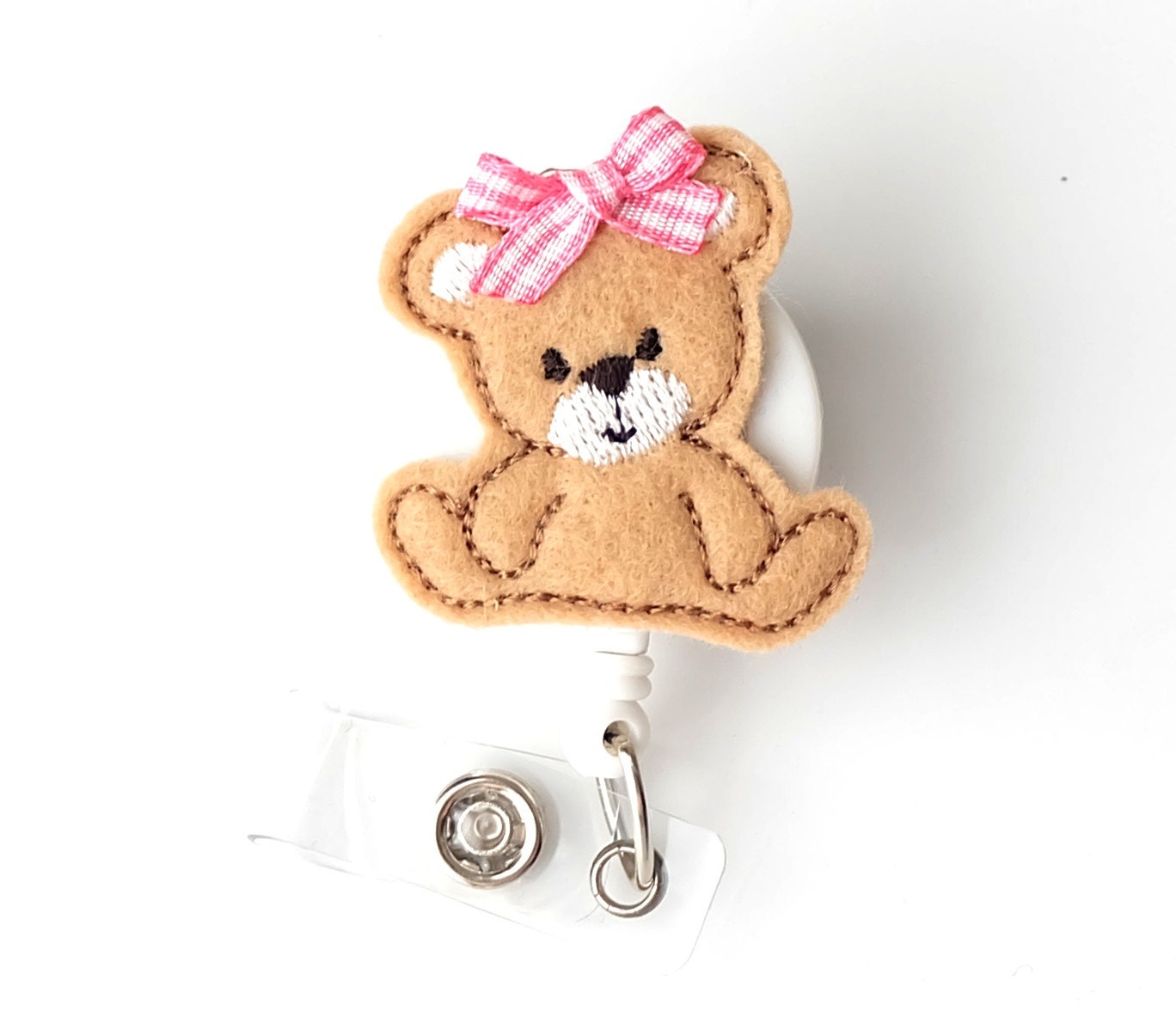 the teddy bear badge