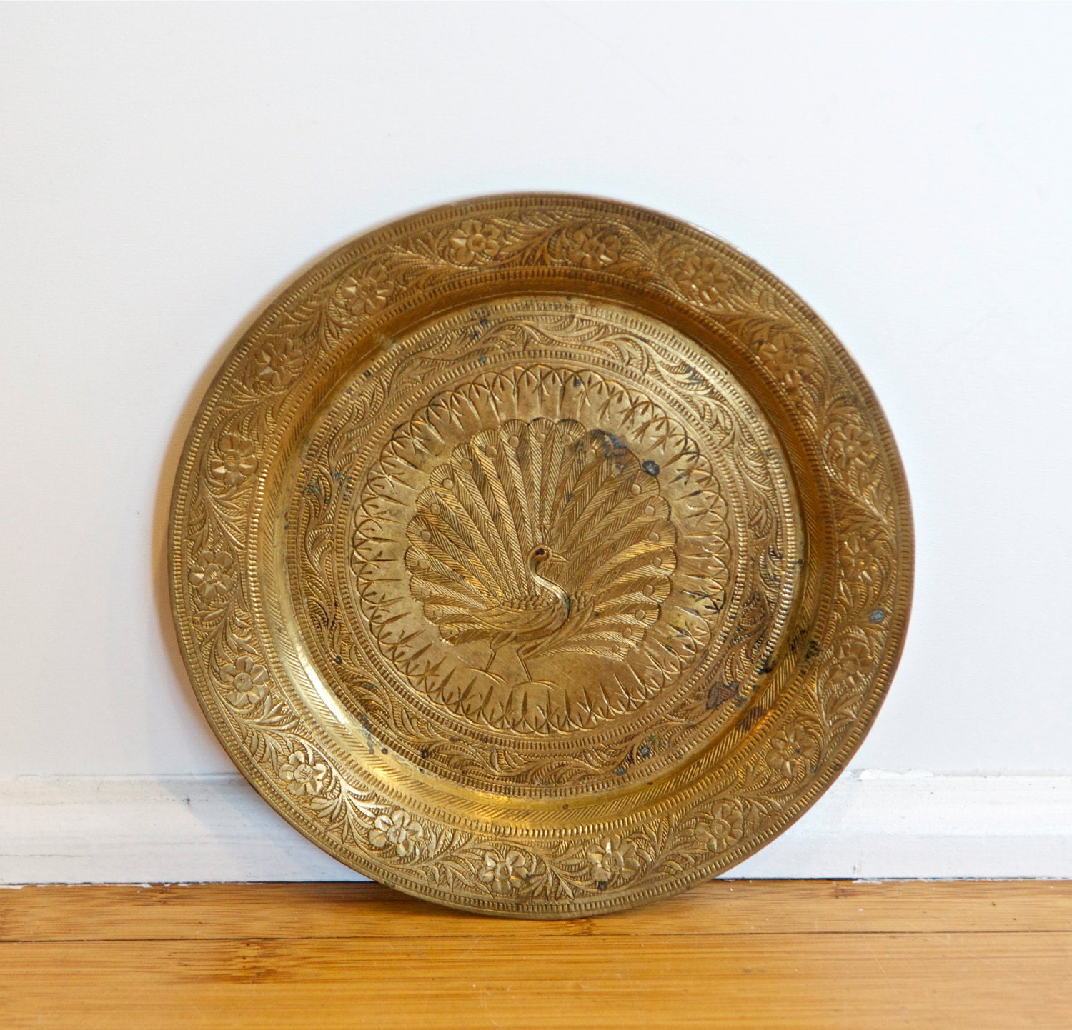 Vintage etched brass plate decorated with a by 180degreesvintage