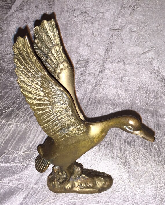 solid brass duck figurines