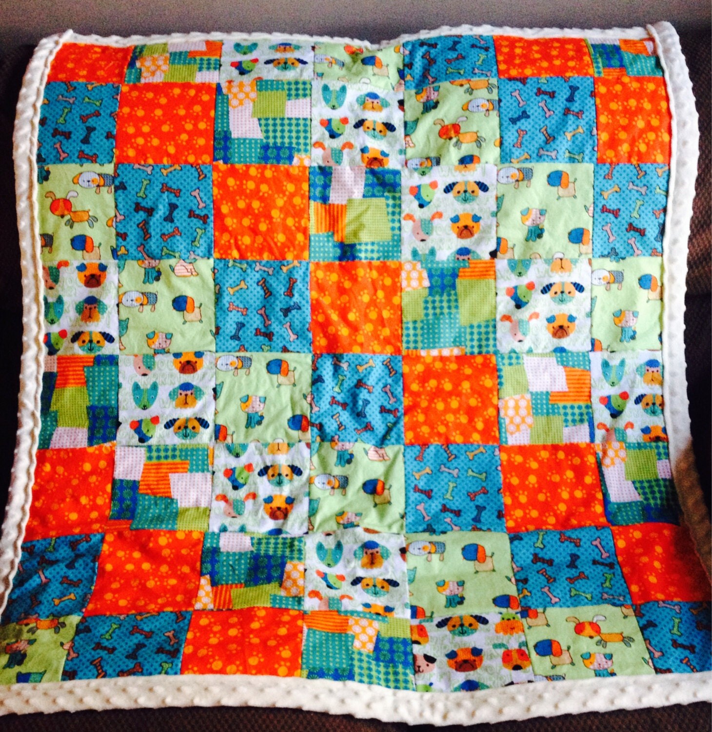 Brightly Colored Cartoon Dog Quilt Orange Blue and Green