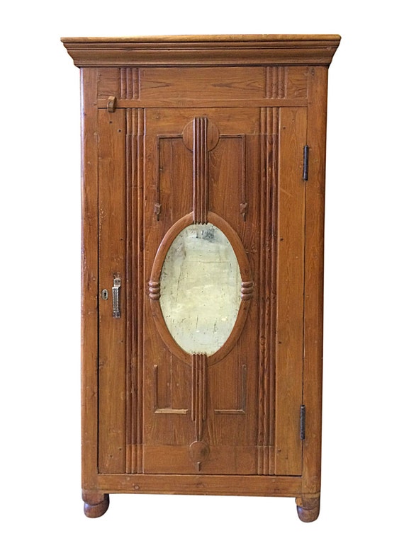 british colonial almirah oval Mirror by MOGULGALLERY