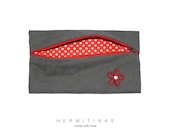 Grey fabric purse with a red flower.Grey Fabric pouch lined with red and white polka dots.Dark grey fabric cosmetic bag.fabric .Zipper pouch