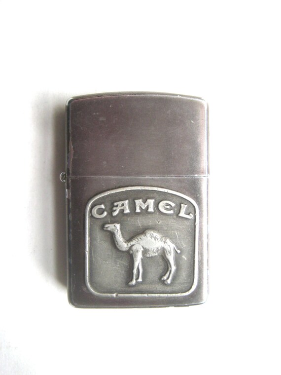 Items similar to Vintage Zippo April 1992 Camel in Relief Cigarette