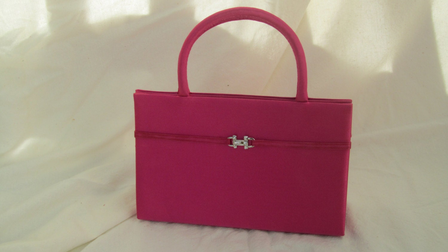 pink satin evening bag