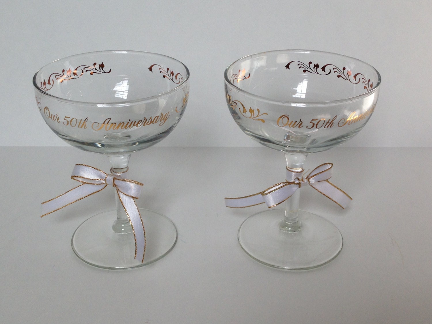 50th Wedding Anniversary champagne glasses by TheTravelingTortoise