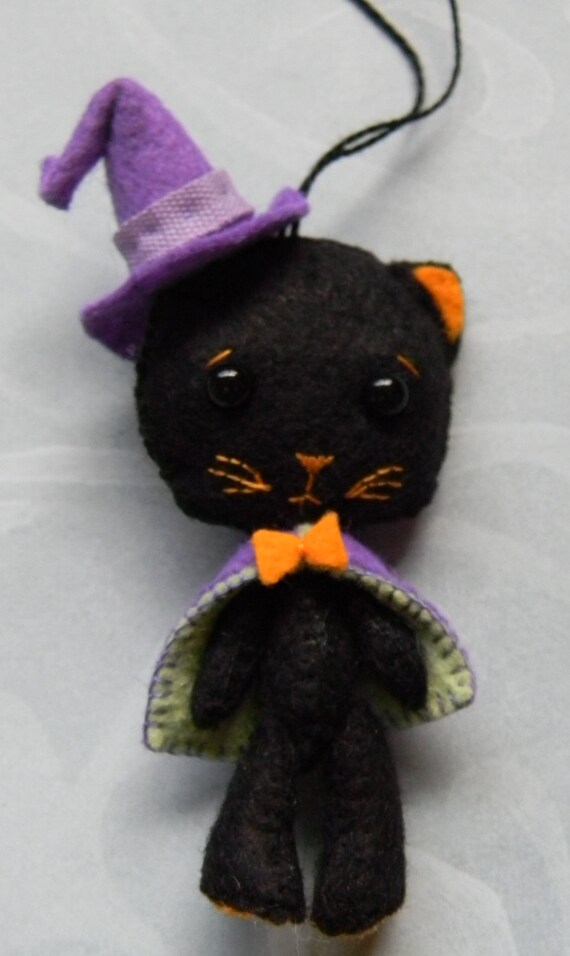 Items similar to black felt witch kittie cat halloween ornament on Etsy