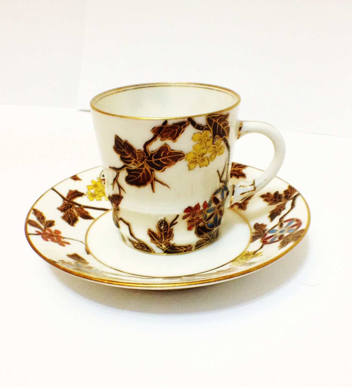 cups back  demitasse Welcome and vintage saucers
