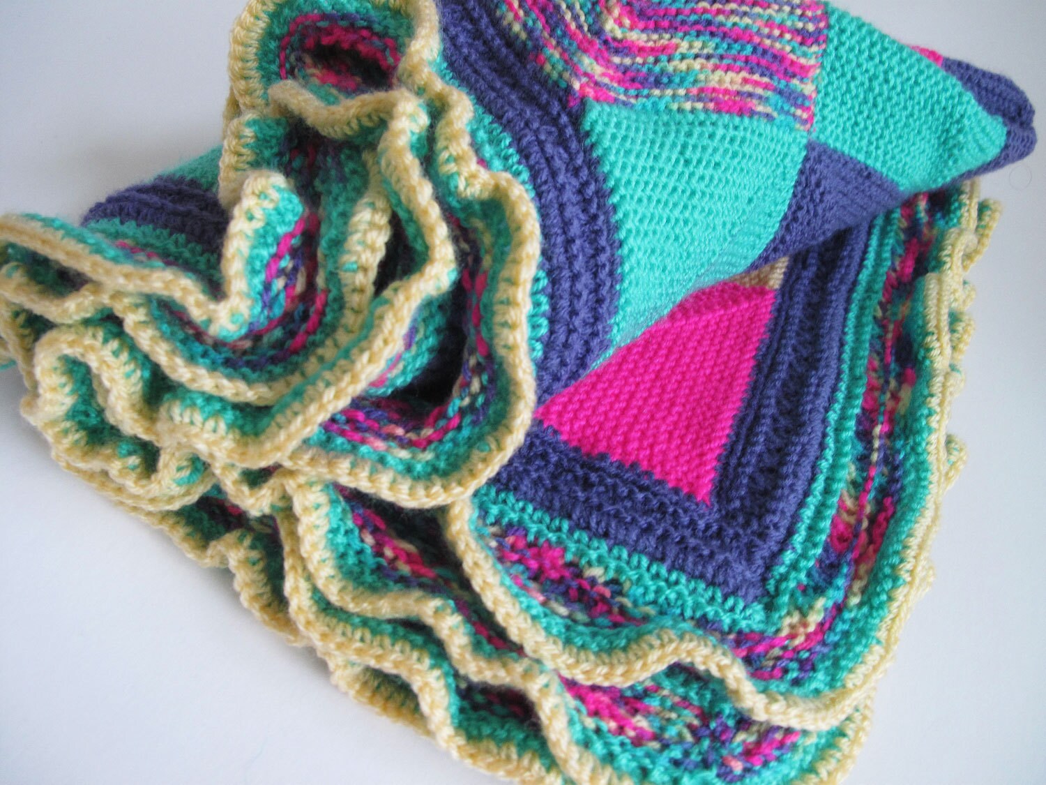 Knit blanket Kneerug or cot cover in lemon purple pink