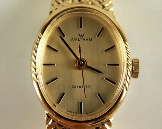 Storewide 25% Off SALE Sophisticated Vintage Ladies Waltham Quartz Watch Designed in a Gold-Tone Band & Dial