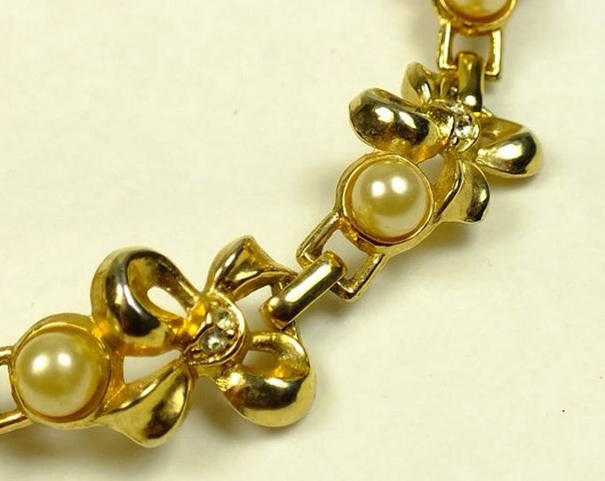 Storewide 25% Off SALE Vintage gold-tone Bow link charm styled bracelet accented with clear crystal stones and lovely cultured pearls