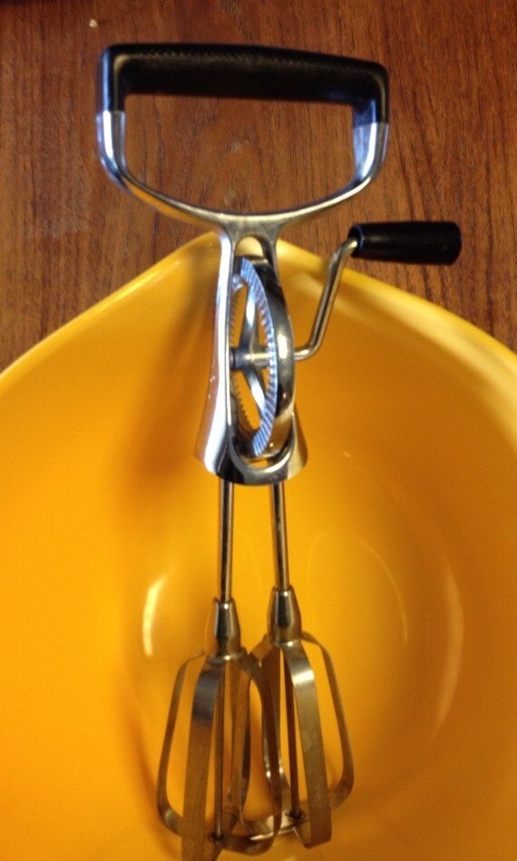 Vintage Handheld Egg Beater by Ekco made in USA.