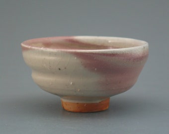 Teacup, wood-fired stoneware w/ blushing shino and natural ash glazes