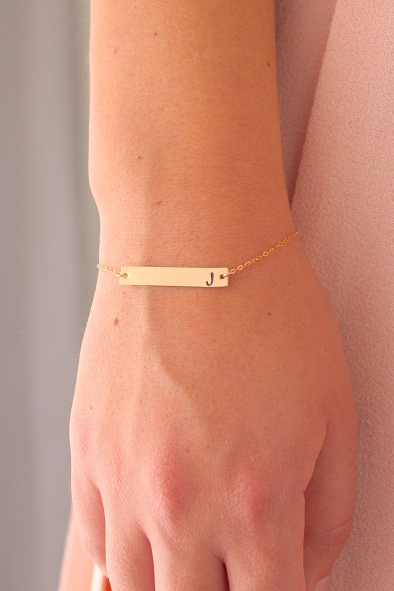 Gold bar bracelet (model photo)