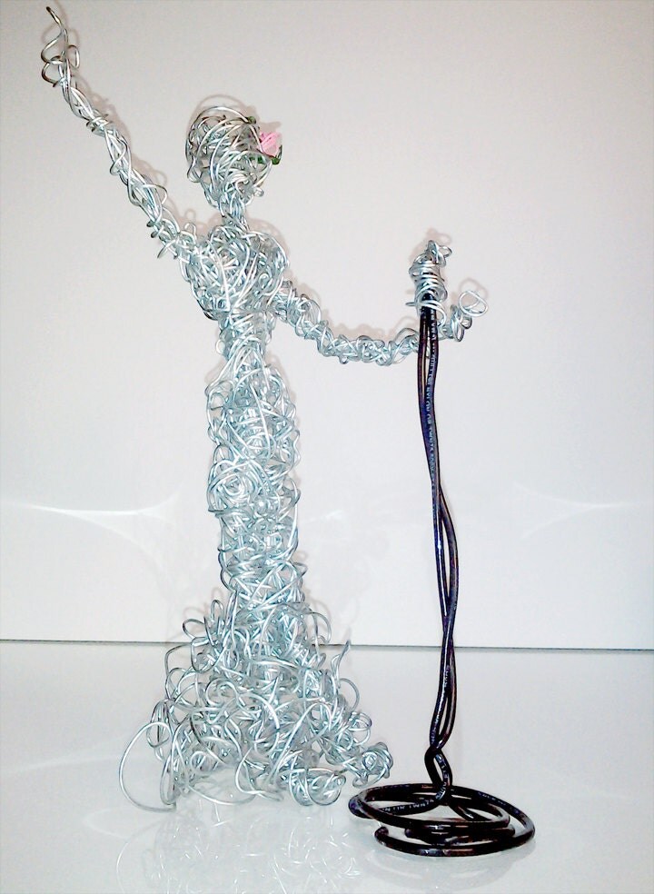 Wire person metal sculpture singing lady opera microphone wire