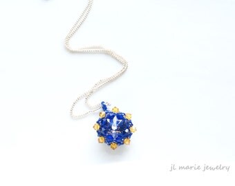 blue & gold crystal pendant necklace . delta delta delta . theta phi alpha . phi sigma alpha . sigma delta tau . sigma gamma rho