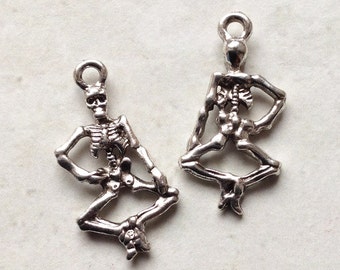Bulk Lot 20 silvertone dancing skeleton charms 25x13mm small Day of the Dead / Halloween trinkets #68a
