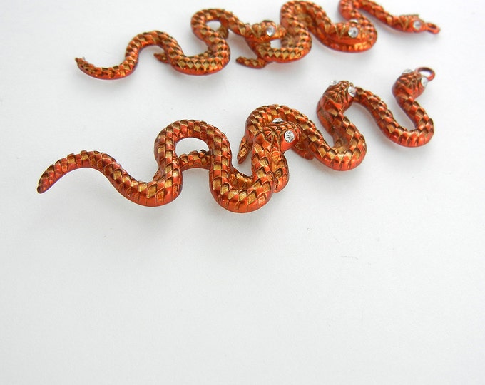 Pair of Long Pearlized Orange Epoxy Triple Snake Charms Rhinestone Eyes