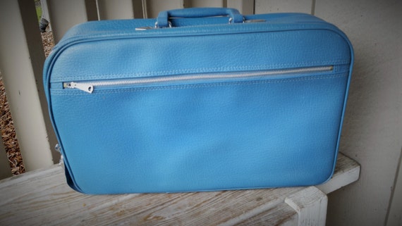 baby blue suitcase