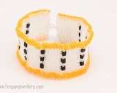 Tangerine rhythms beadwoven cuff bracelet, white, black and orange, glass beads, handmade, pattern, check