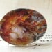 Flaming hair, autumn leaves, Art Nouveau woman, 40x30mm, Gust of Wind, oval glass cabochon, horizontal, fall leaves, orange