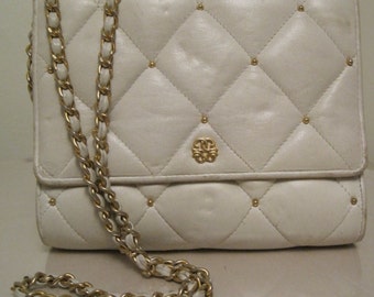 white leather quilted bag