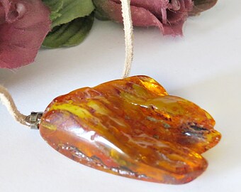 Elegant pendant of natural genuine Baltic amber./ 100% Natural Genuine Baltic Amber.