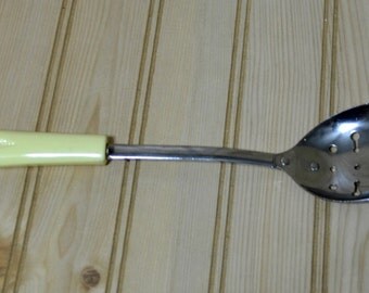 Vintage Slotted Spoon Ekco Serving Curved Yellow Handle Chromium Plated USA Utensil