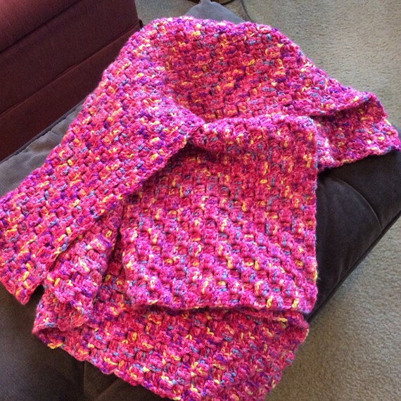 A lap robe small blanket wheelchair robe in variagated colors