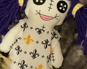 saints voodoo doll