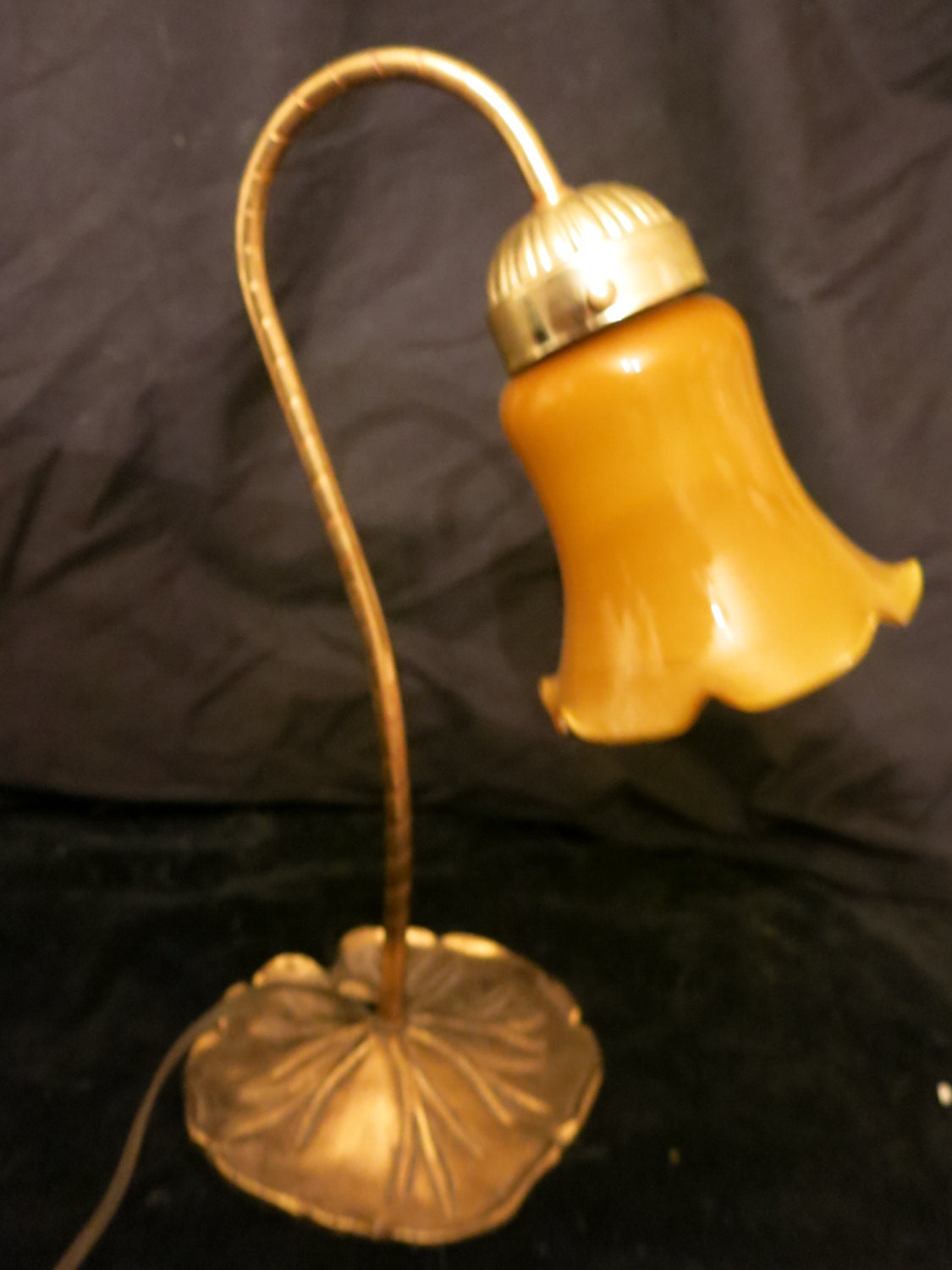 Vintage brass lotus leaf base lamp with gold glass shade