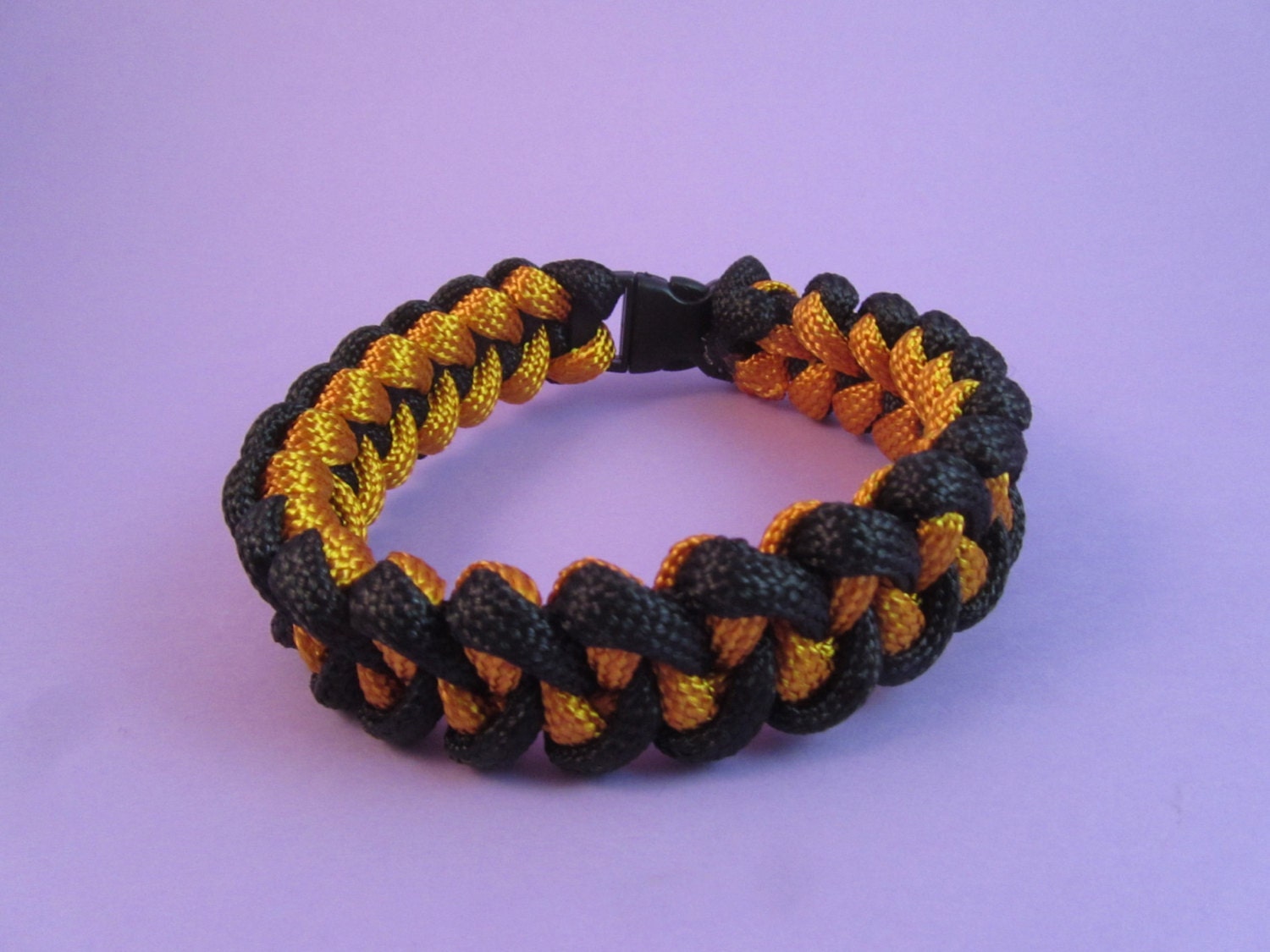 Black Gold Shark Jaw Bone Paracord Bracelet by SerendipityFinch