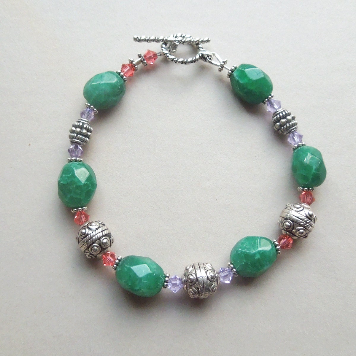 Emerald green bracelet with crystal and silver accents