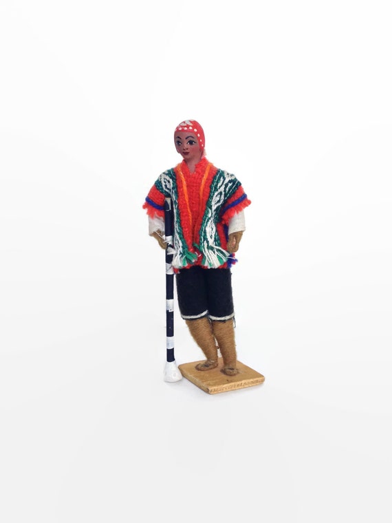 Handmade doll woman in sarape ethnic figurine