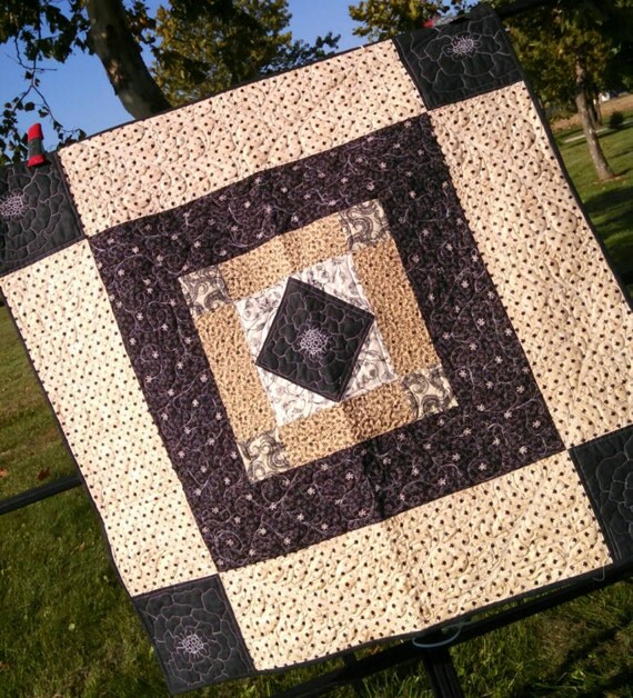 Small Black and tan floral quilt by Quiltmine on Etsy
