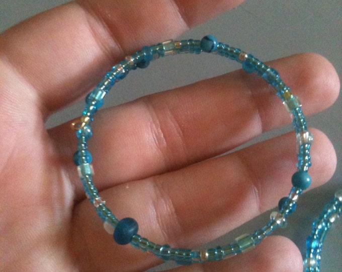 clearance! light blue glass beaded memory wire bracelets