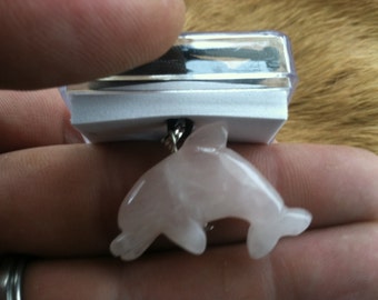 Carved stone Dolphin necklace. Made of Rose Quartz