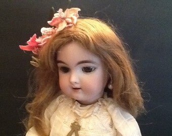 Antique German bisque doll. Heinrich Handwerck.