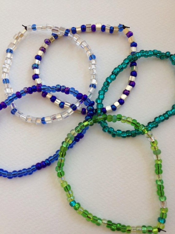 Seed bead stretchy bracelet by SozoJewelleryDesigns on Etsy