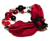 Bracelet of silk, lampwork glass, Czech glass and crystal.