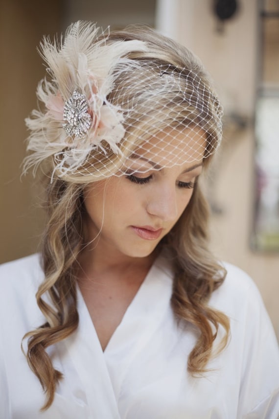wedding guest hairstyles for long hair with fascinatorimage