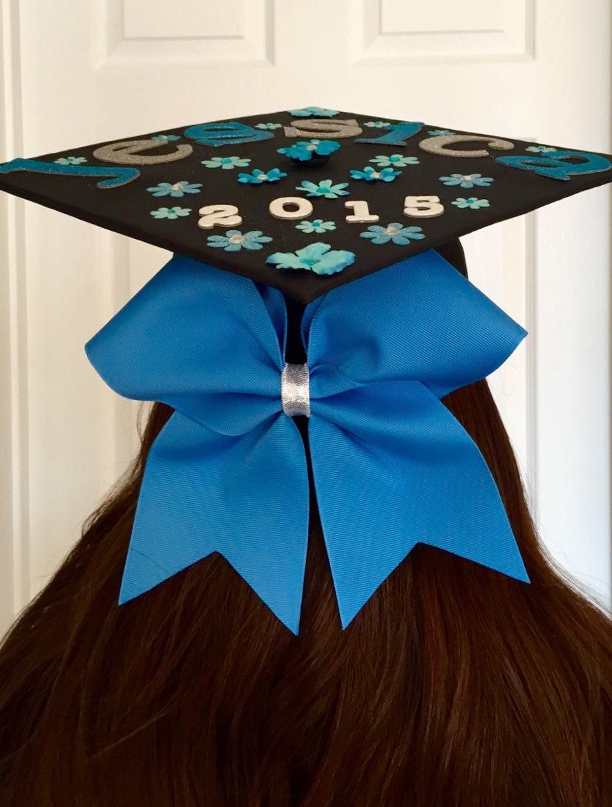 Graduation cap cheer bows.