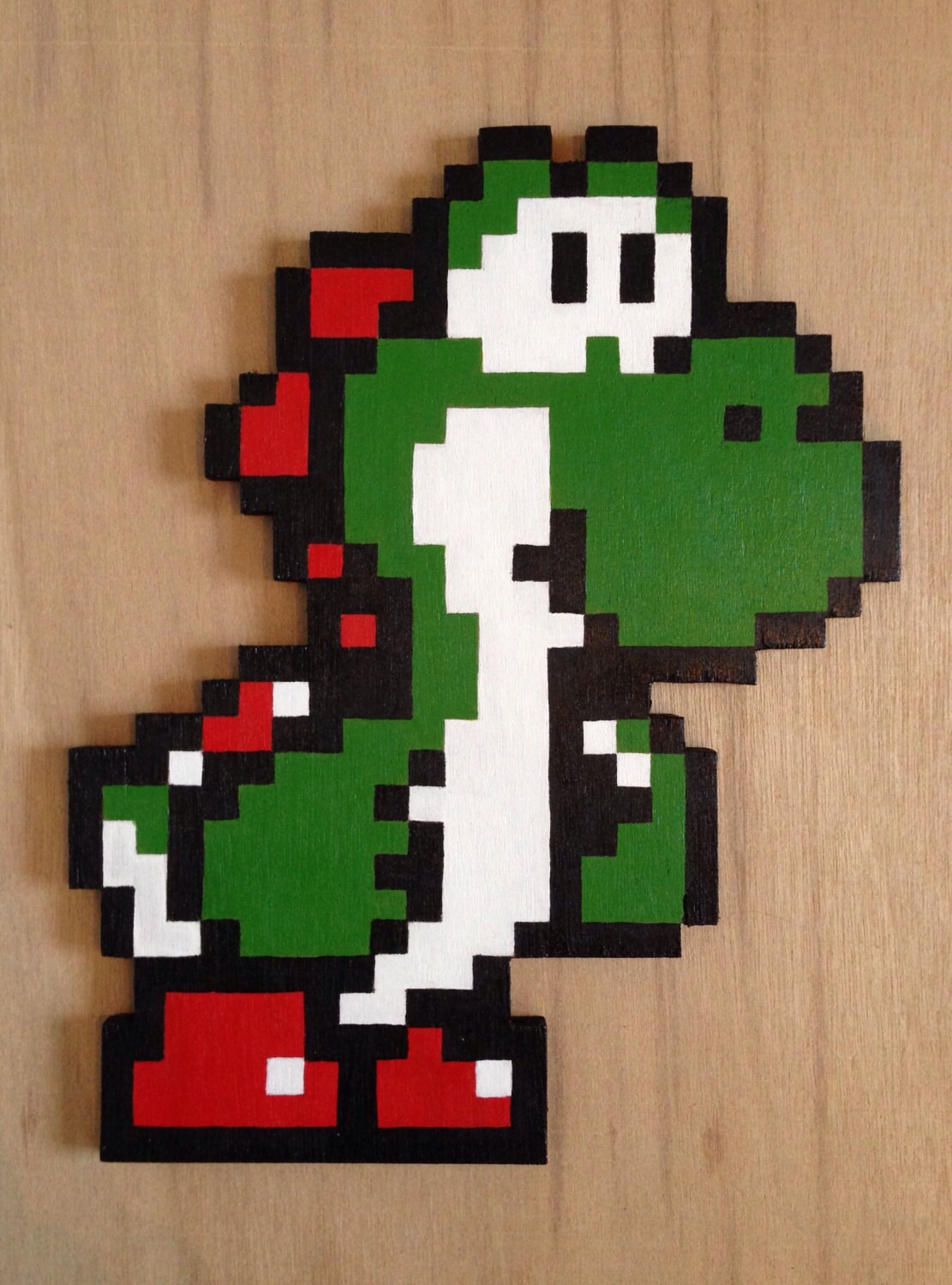 Handmade wooden pixelated yoshi from super mario 8bit pixel