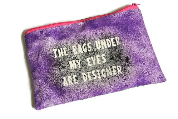 Ladies Purple Make up Bag Funny Quote 'The bags under my eyes are ...