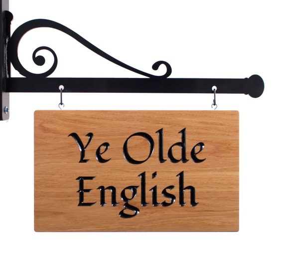 Hanging shop sign exterior sign with iron by SignBrother