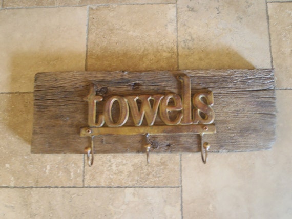 Items similar to Rustic towel bar made out of century old reclaimed