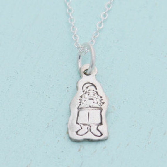 small sterling silver tubbler with gnomes