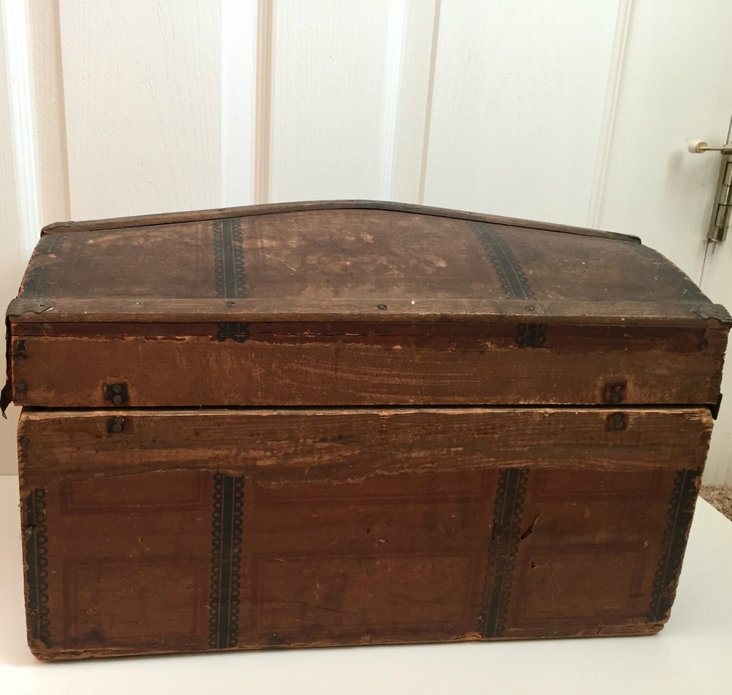 small antique camelback wood trunk