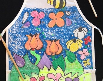 Garden Apron. For all ages. Ties in back allowing all sizes to wear, machine washable. Two pockets in front.